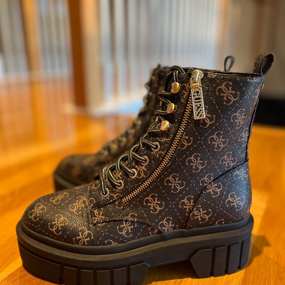 Black and brown Guess boots